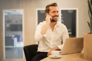 A corporate executive under extreme stress representing executive burnout at senior leadership level