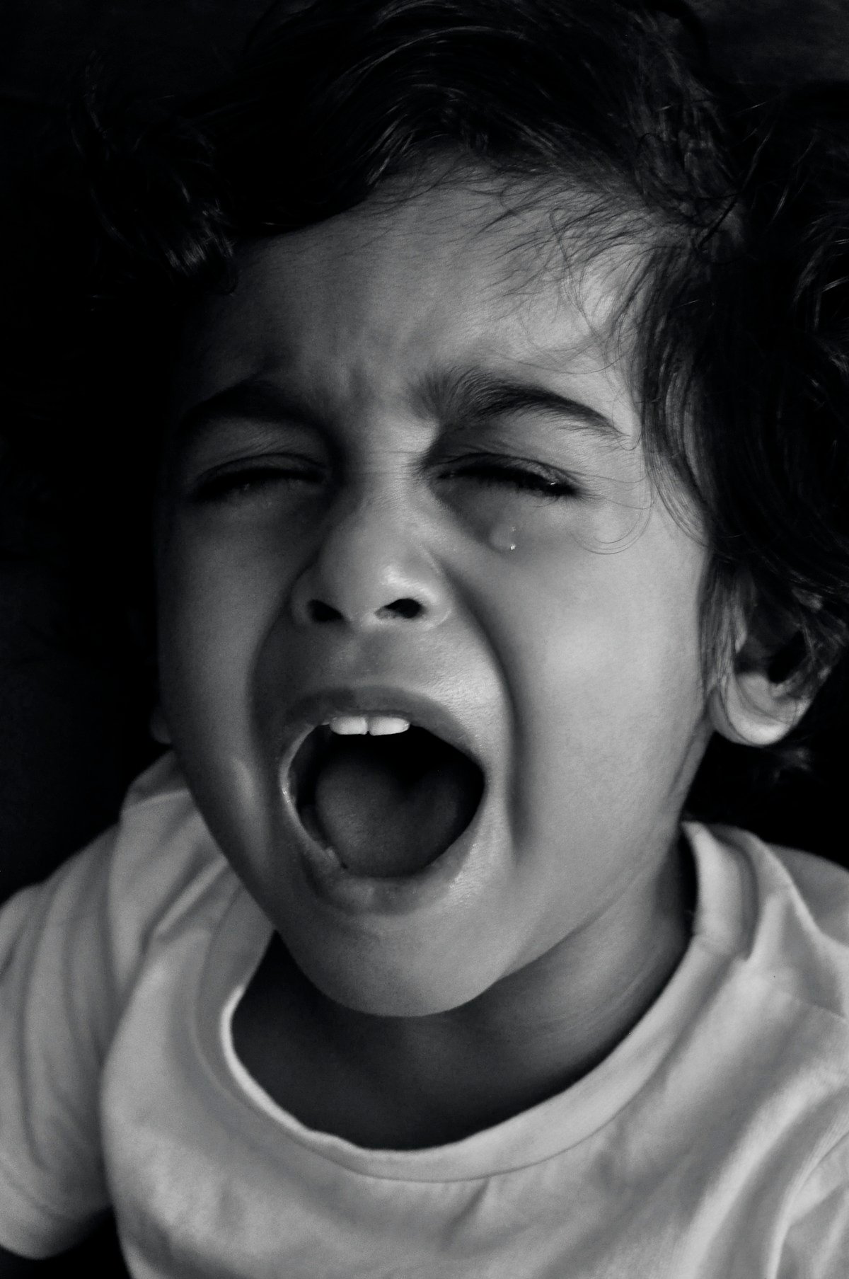 Indian child laughing happily — positive autism treatment outcomes Mumbai psychiatrist