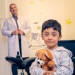 South Asian child giving high-five to doctor during a positive medical consultation – child psychiatry and therapy, Mumbai