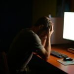 A person experiencing digital burnout and exhaustion